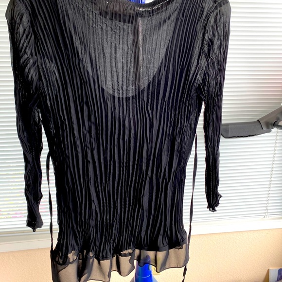 Cute dressy blouse worn one time. - Picture 1 of 3